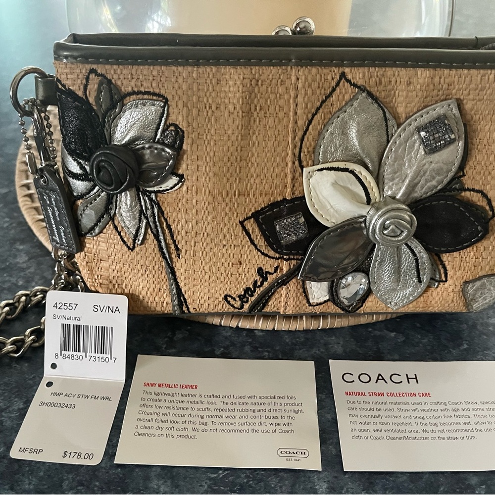 Coach Black and Silver Clutch Elegant Design